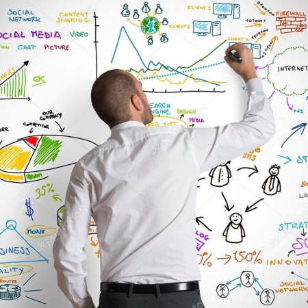 depositphotos_18937211-stock-photo-businessman-drawing-business-graphics-and